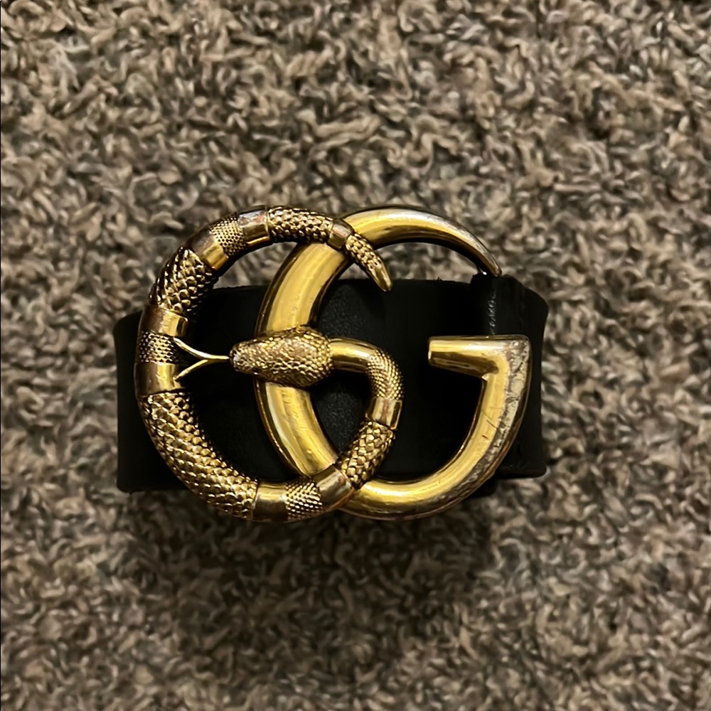 Gucci Black and Gold Belt with Iconic GG Buckle